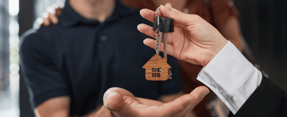 people being handed their house key