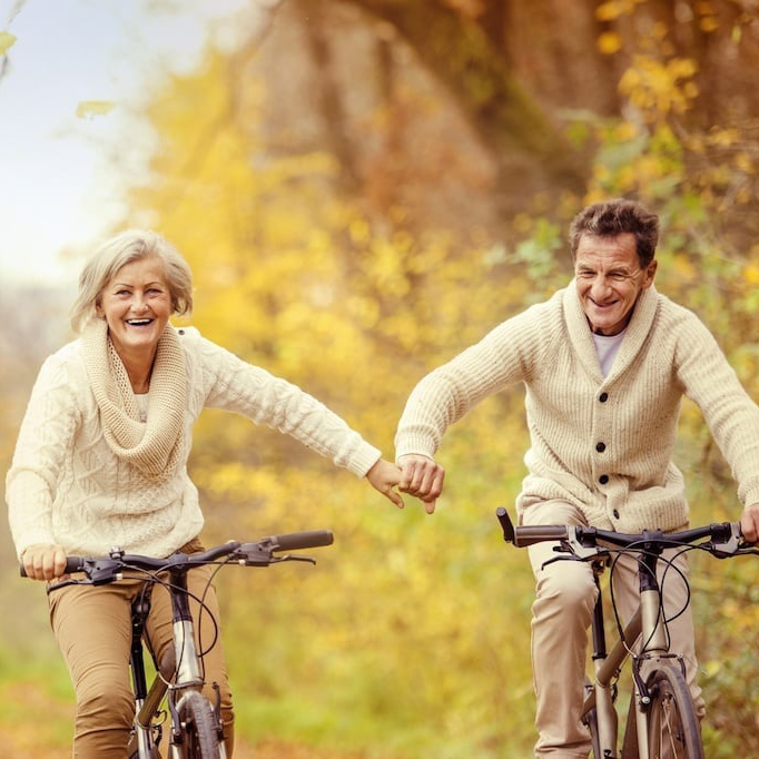 active-seniors-riding-bike--cropped