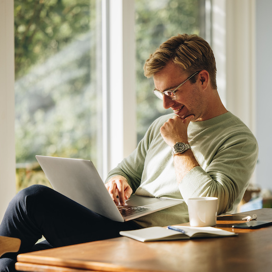 young-man-on-comp--cropped_425210703