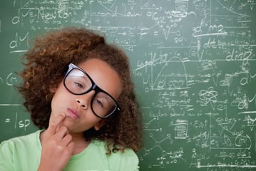 Cute pupil thinking against rocket science theory