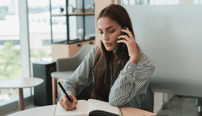 woman on the phone trying to remove collections from her credit report