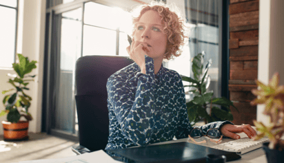 woman wondering and looking thoughtful