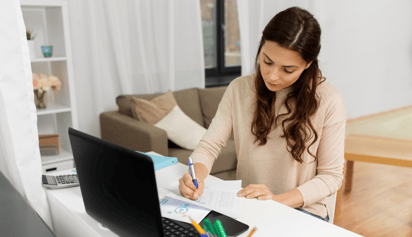 woman filing her taxes