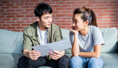 couple discussing their finances and credit cards